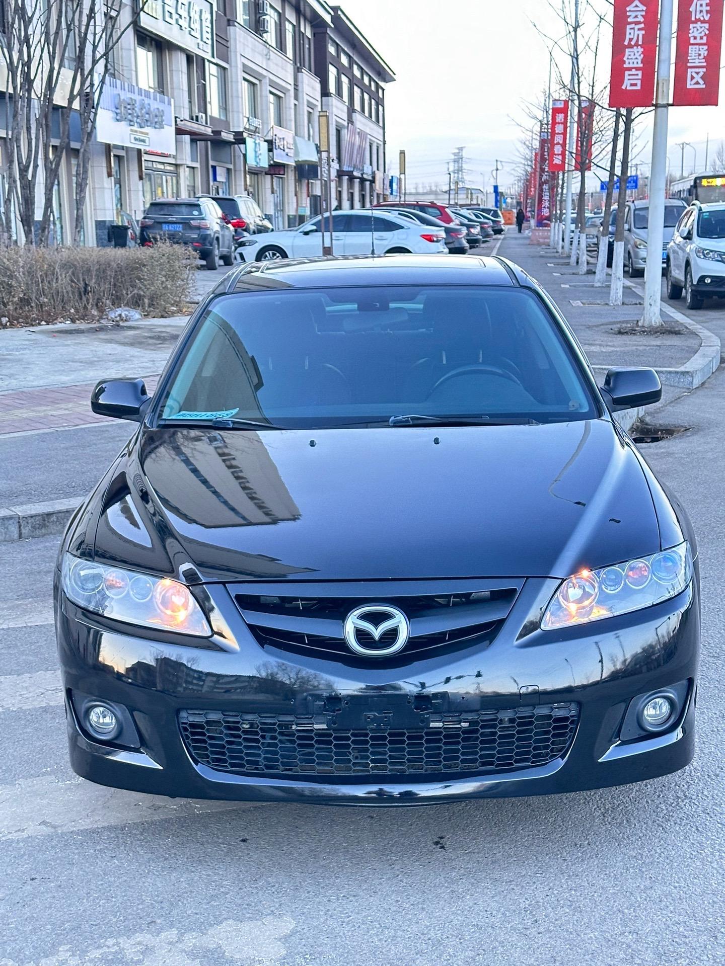 2006年马自达6轿跑2.3排量,手动挡6速!