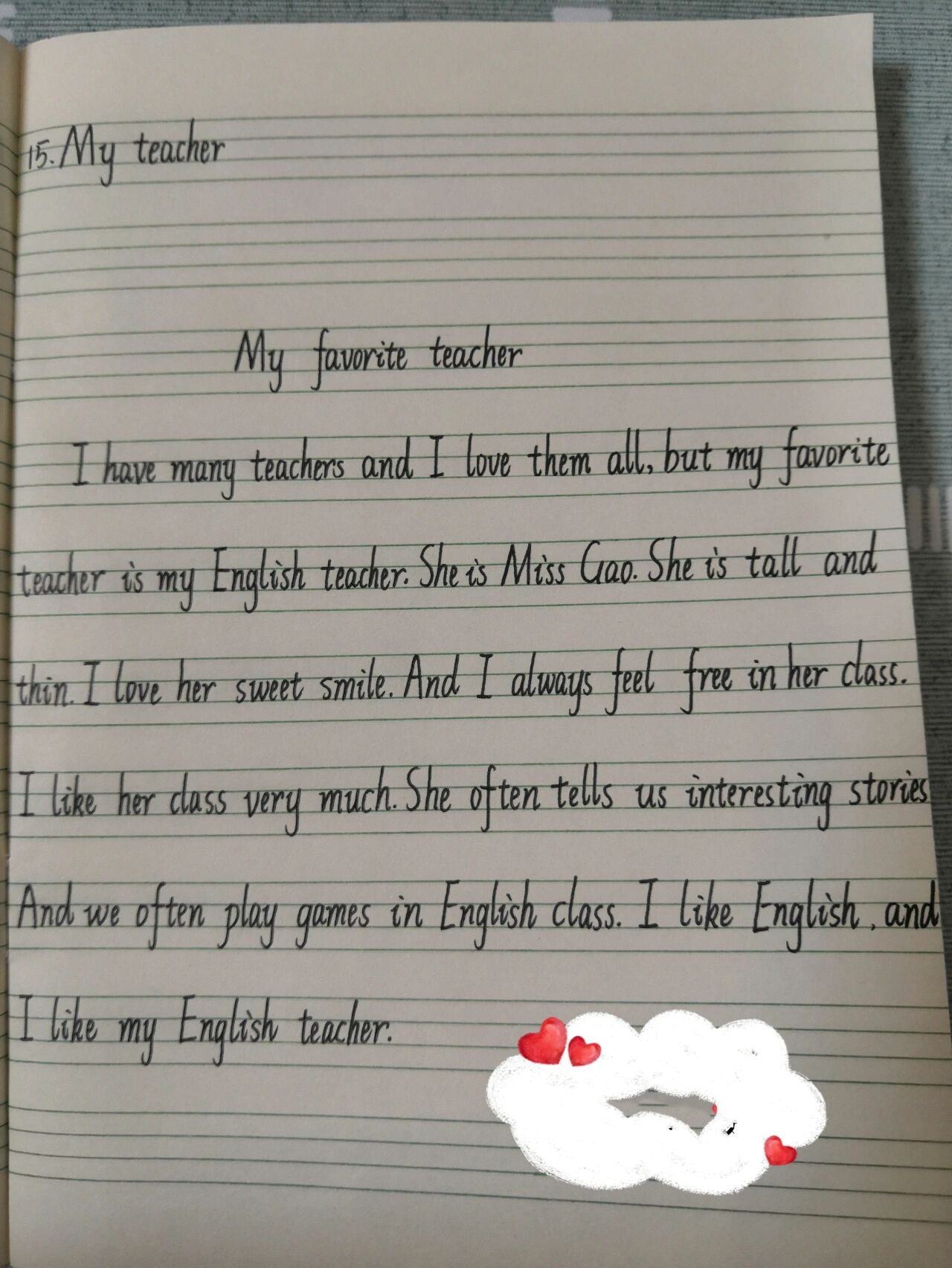 15.小学英语作文 my favorite teacher