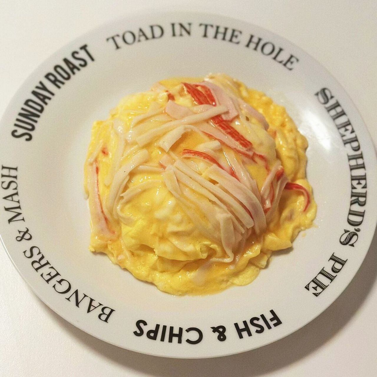 9297食谱分享|蟹棒滑蛋饭 步骤: 16615碗中打入适量的鸡蛋