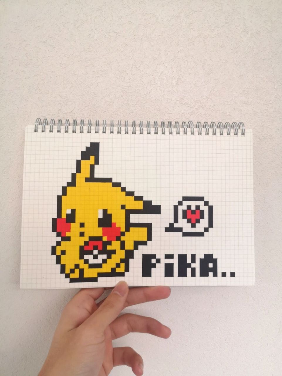 像素画:皮卡丘78 临摹自:九儿 网格本:b5 #皮卡丘# #像素画# #精灵