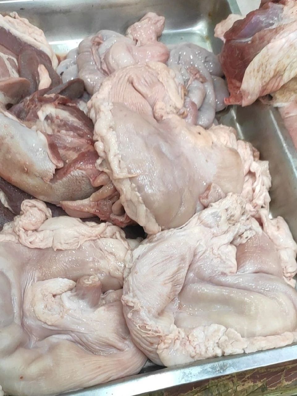 买猪肚看颜色还是看重量?