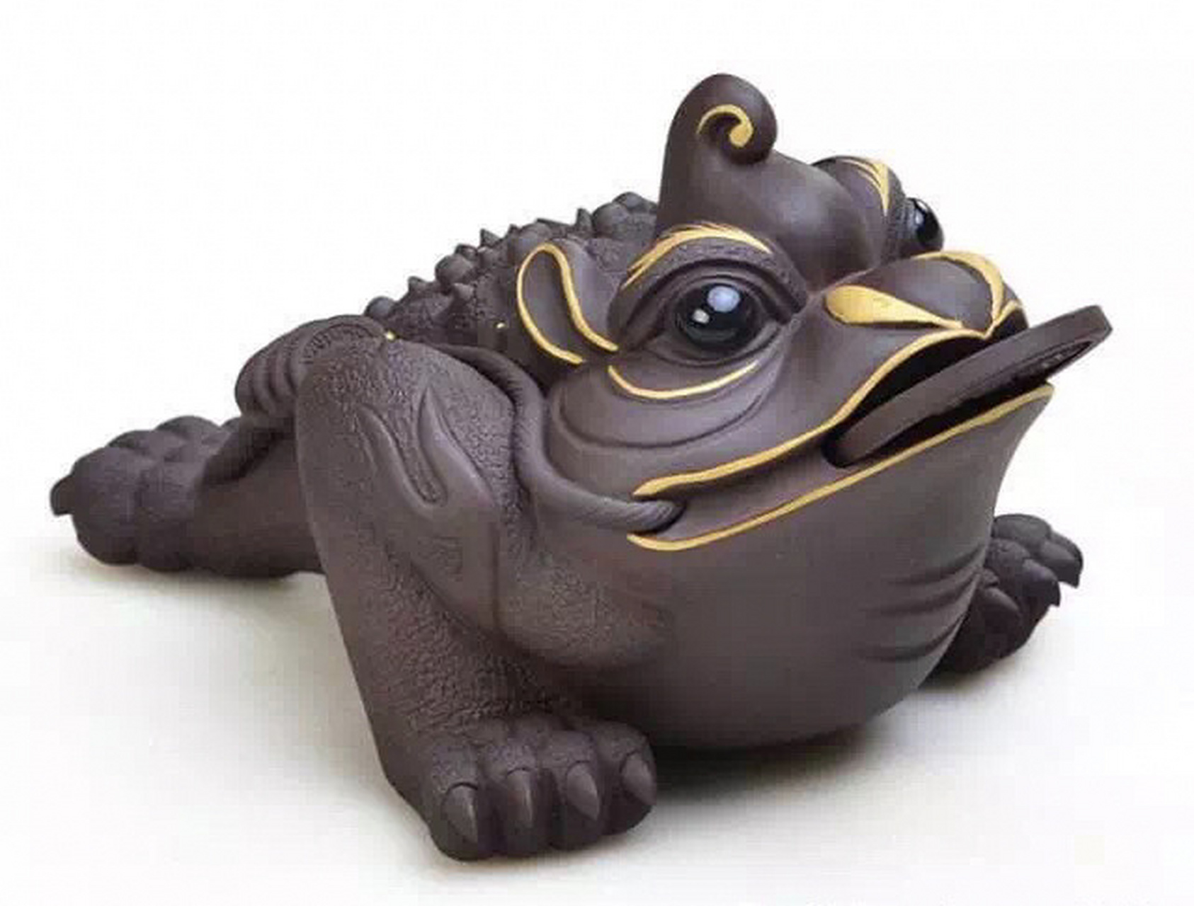 招财金蟾 金蟾: 在风水中,金蟾一般是指蹲坐于大金钱之上的三足蟾蜍