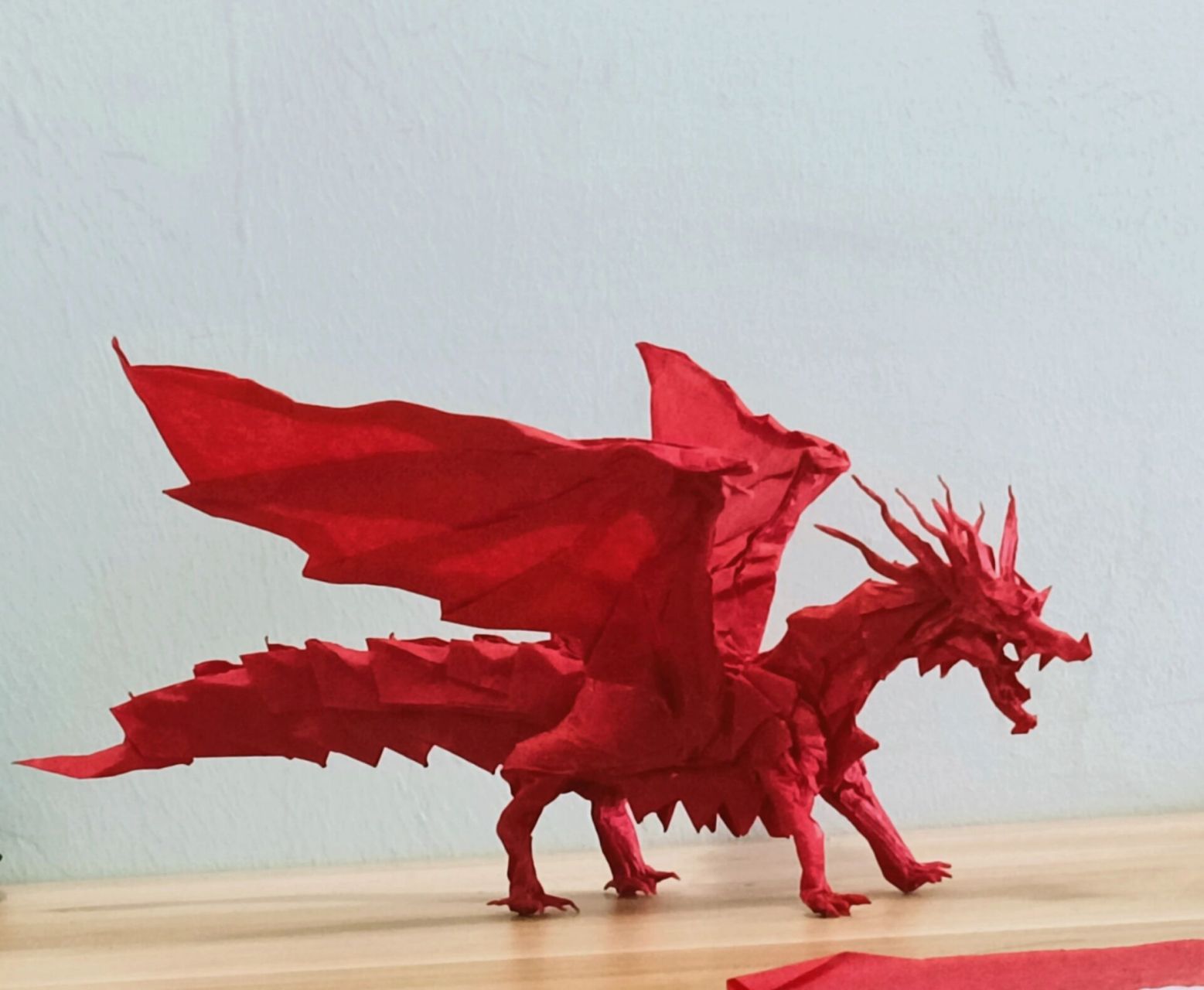 折纸教程——新古代龙 用纸:全开红色油纸 设计:神谷哲史 折制:执纸之