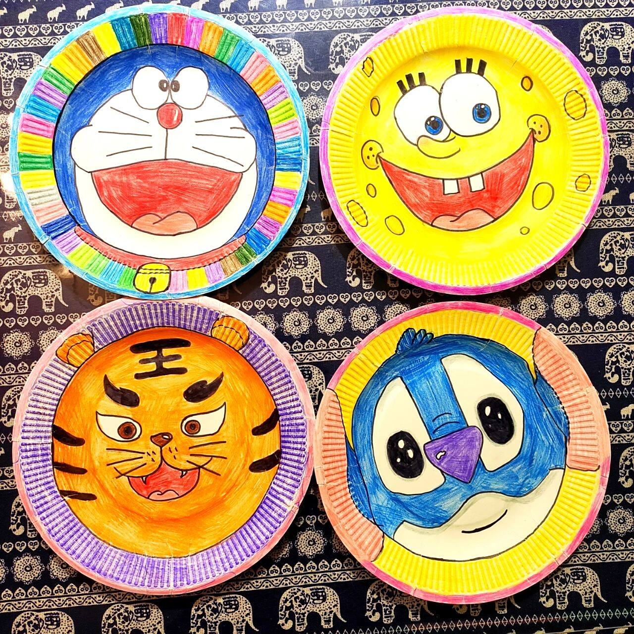 可爱的盘子画 可爱的盘子画 材料:彩铅  一次性纸盘子