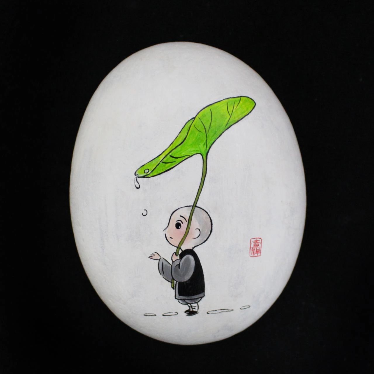 画了一个一禅小和尚的石头画,小禅意作品