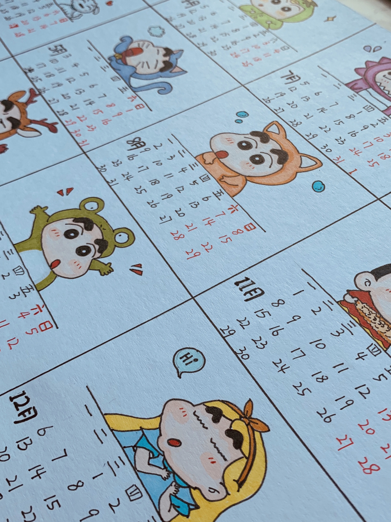 制作了一张小新的简笔画年历,还附上了过程图.