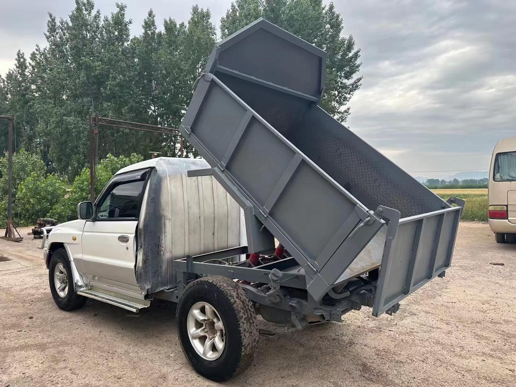 猎豹黑金刚改装翻斗自卸,柴油五十铃发动机,手动4驱,裸车出售