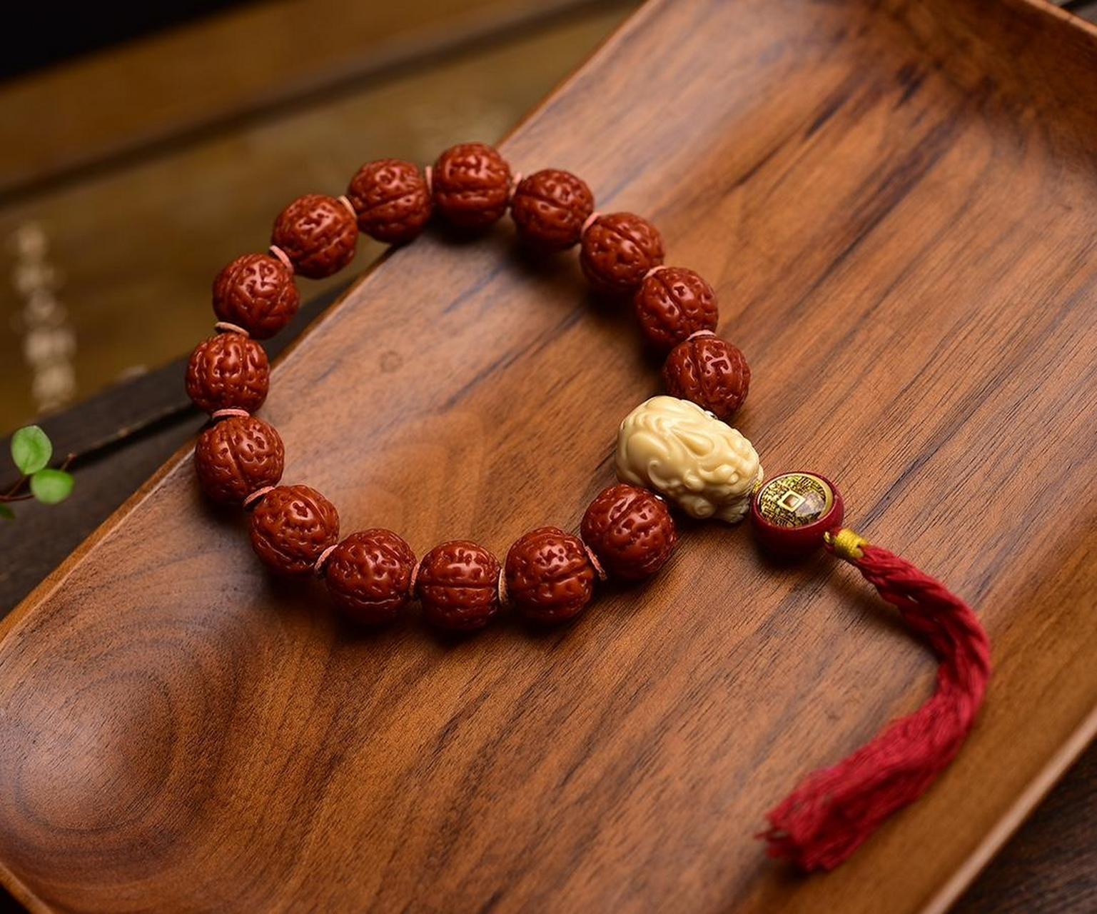 97招财肉嘟嘟跳跳龙小金刚菩提子文玩手串.