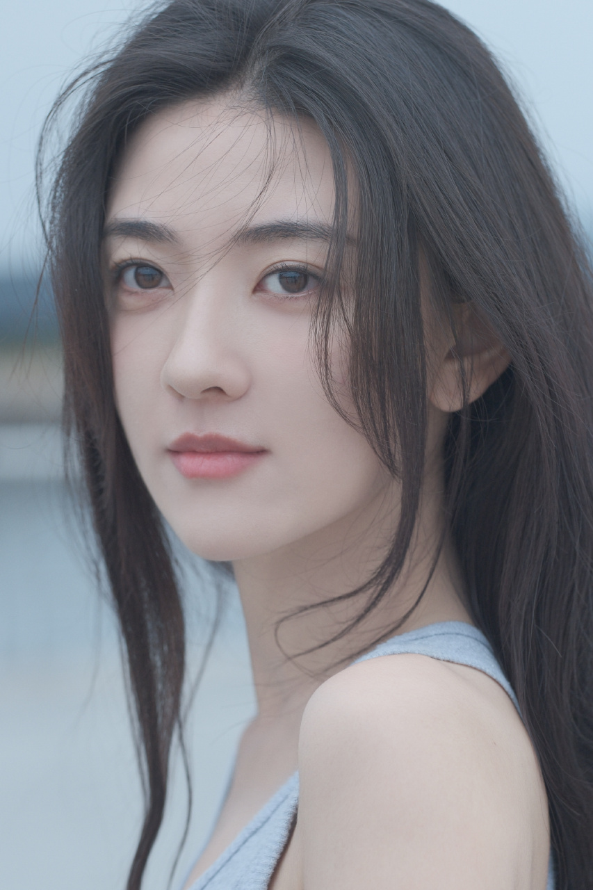 梁洁海边小清新写真组图:纯白的浪漫,干净的温暖,风听到那些心里的