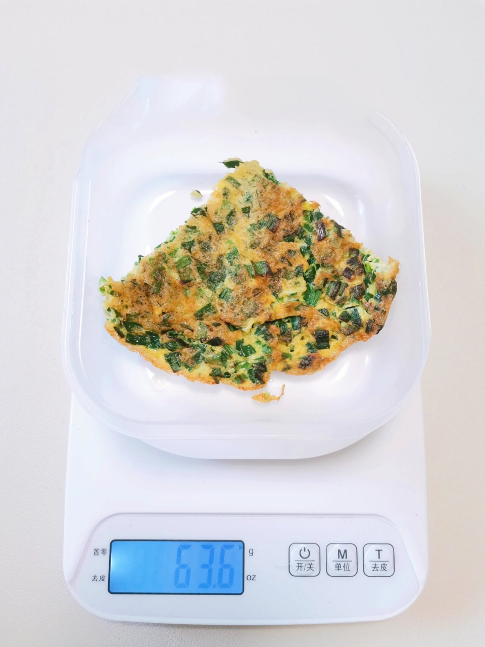 热量测评|韭菜鸡蛋饼 一角善良的韭菜鸡蛋饼 净重:40.4g 热量:39大卡