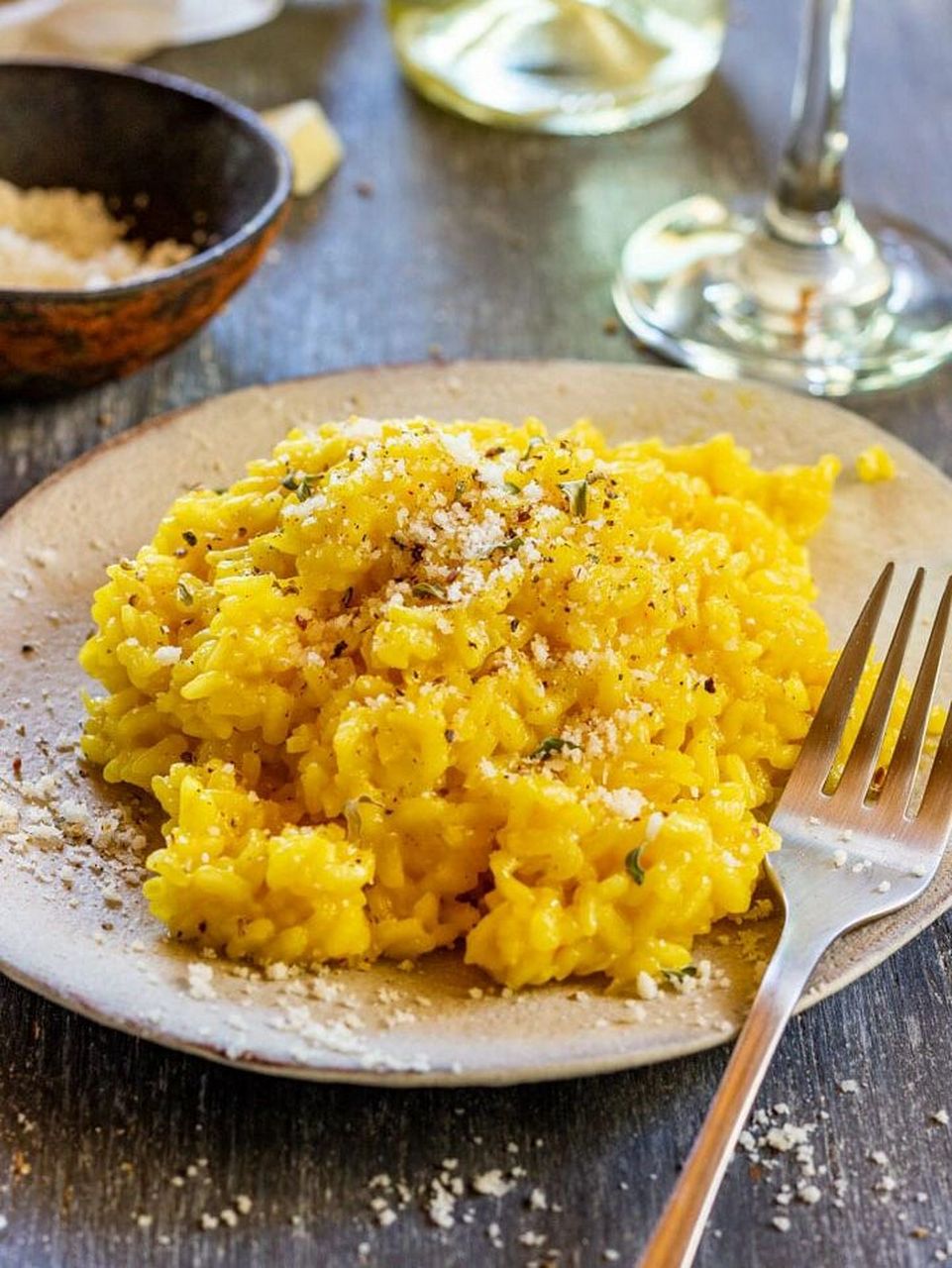 这是一道用长粒米在肉汤中煮熟的经典菜肴9495米兰烩饭是意大利