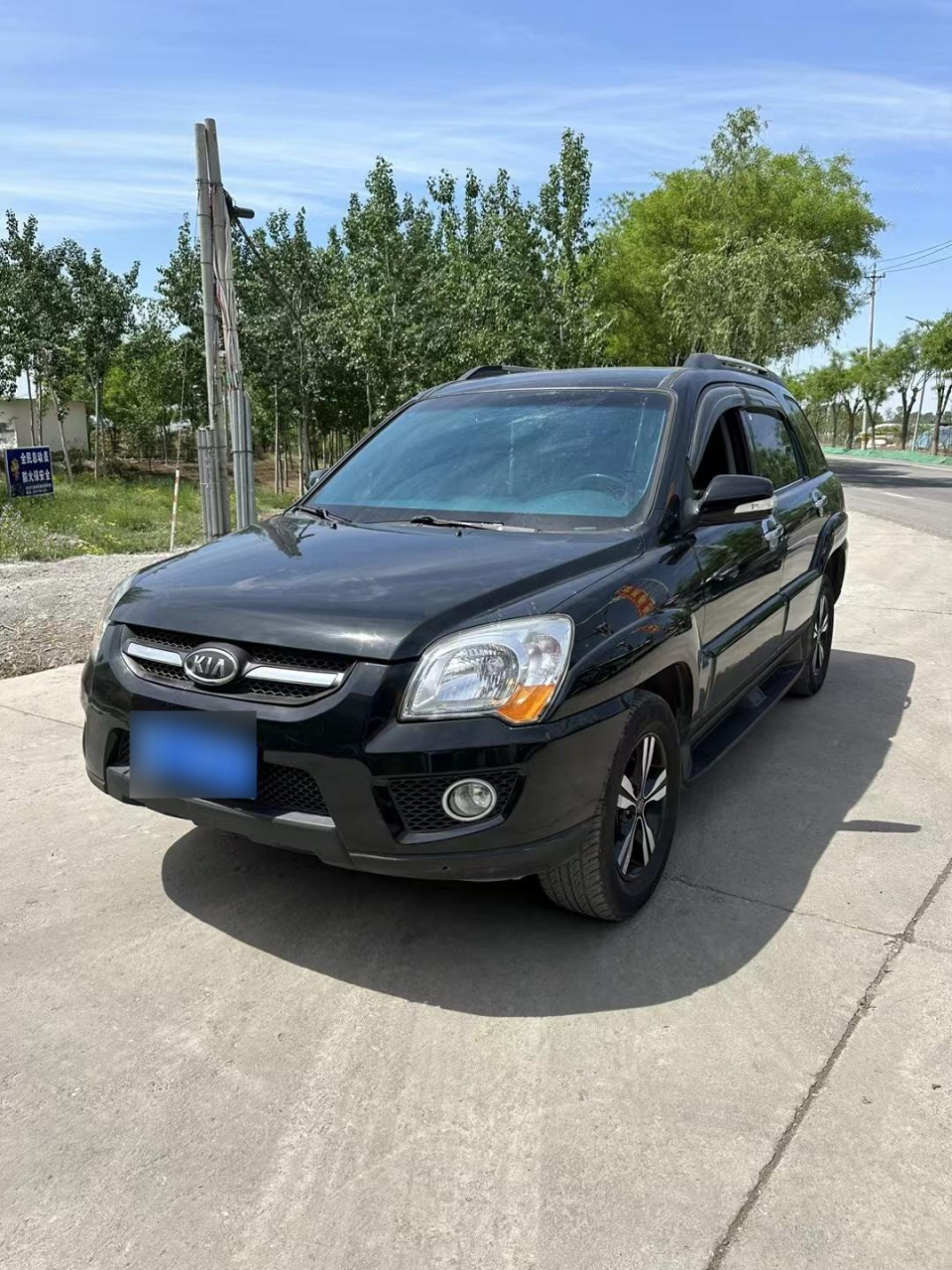 新到11年起亚狮跑,自动挡最高配越野神器,黑车黑内饰,发动机变速箱