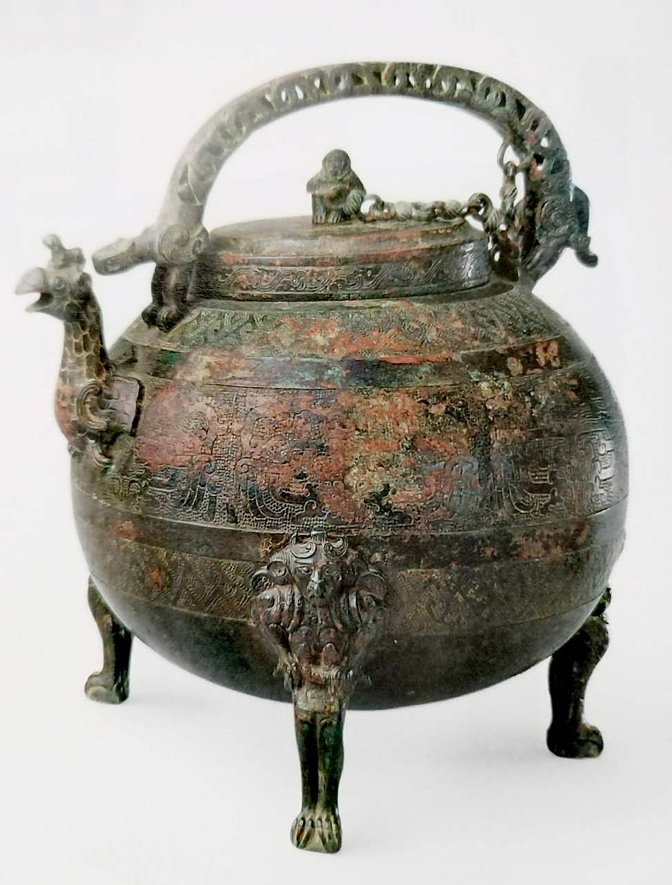 文物欣赏:  战国   青铜提梁盉  此器为战国青铜提梁盉.