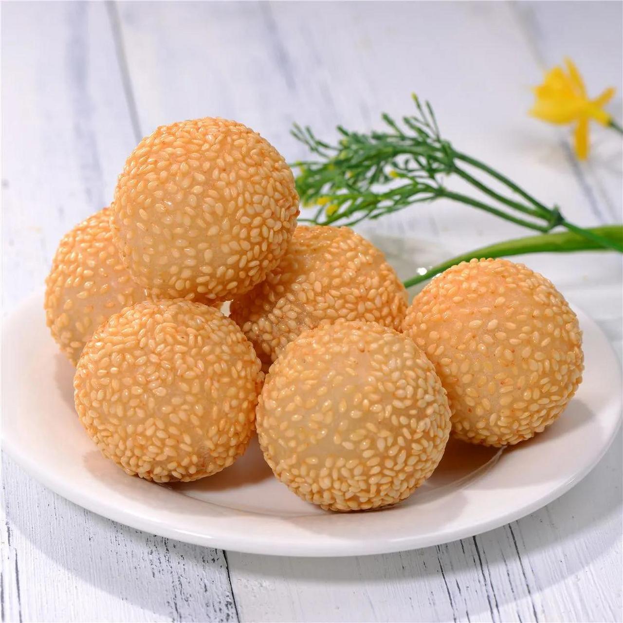 上海美食之"炸麻球" 上海炸麻球:产地为上海市市中心浦东南路一家名为