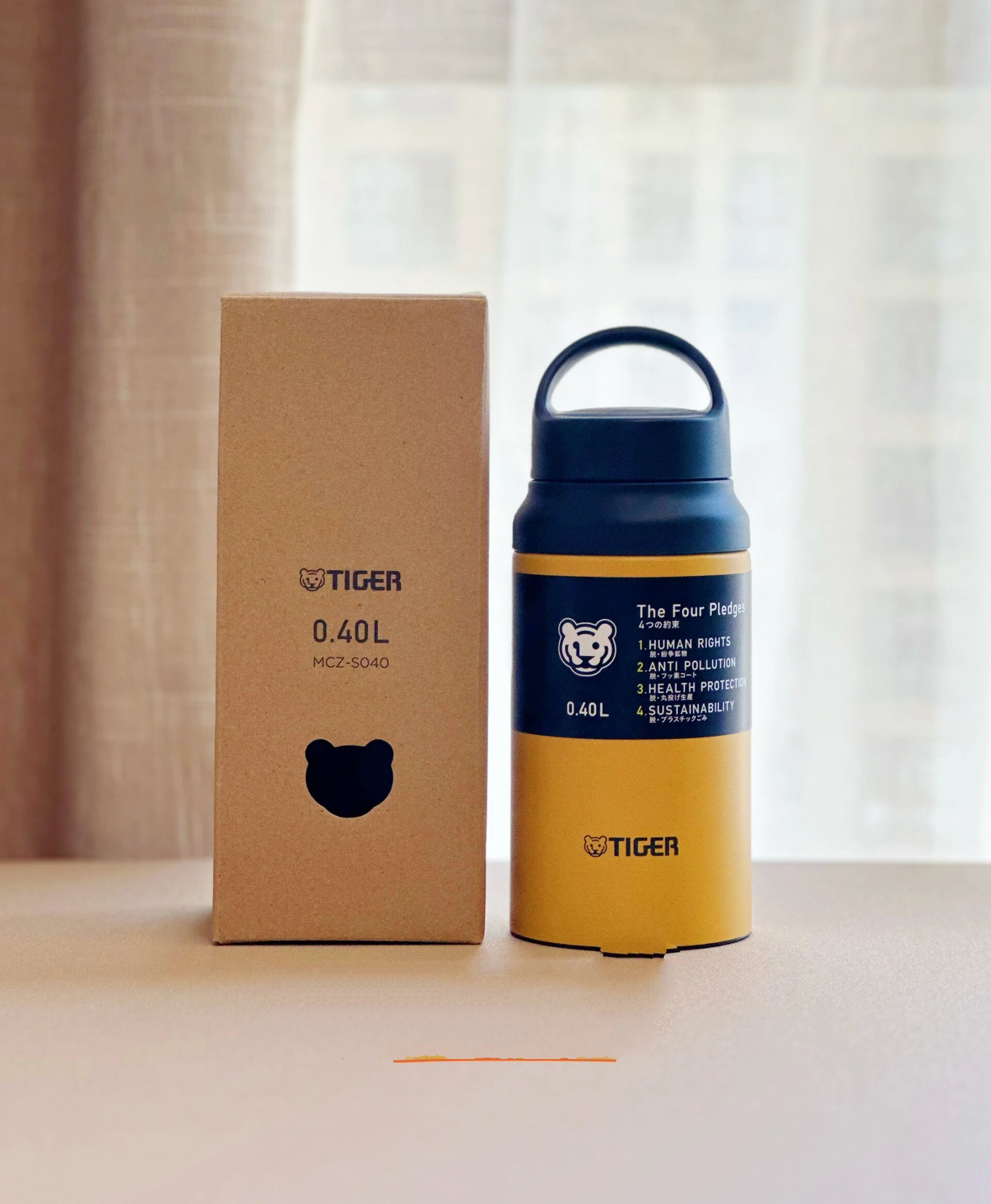 日本 tiger虎牌 黄色400ml带茶漏手提保温杯