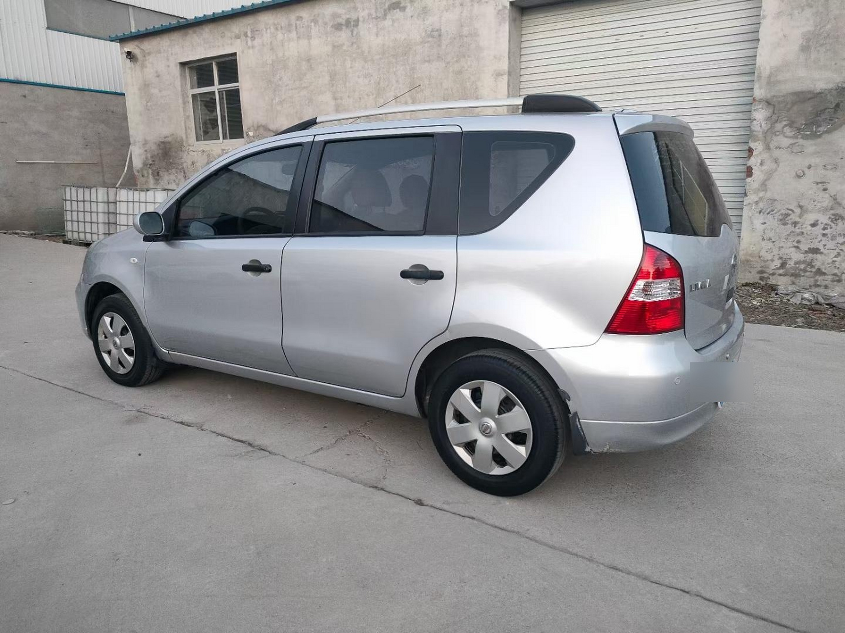 11年日产骊威,1.6手动,全车原版原漆,纯一手车,实表九万公里.