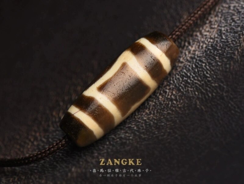 至纯天珠图腾里面的"息增怀诛" 天珠的图腾纹路大致包括:点,线,方,圆