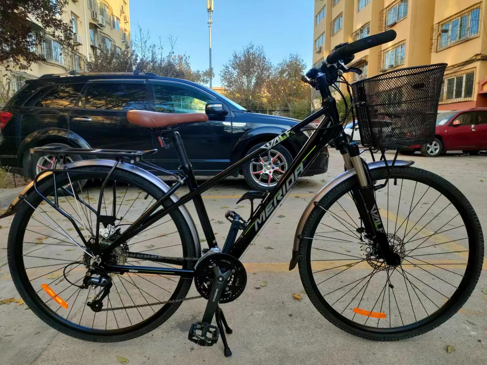 九成新美利达野狼5旅行车,27速油压碟刹,铝合金17寸车架,肩控锁死避震