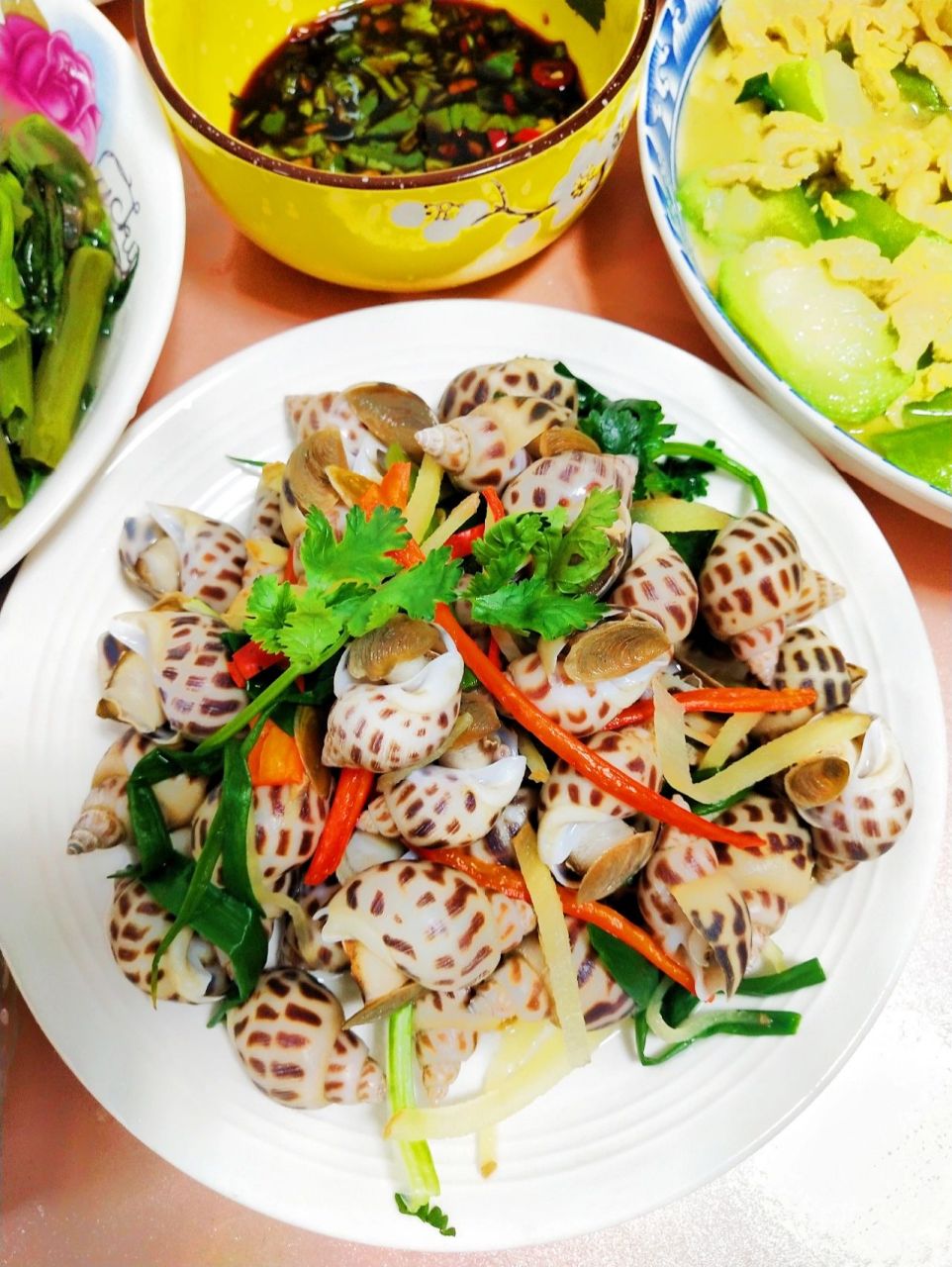 色香味俱全的白灼花螺 今天来分享一道白灼花螺,味道鲜美可口有劲