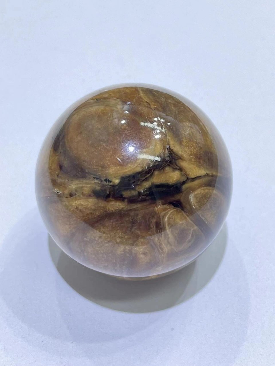 缅甸琥珀根珀大球5.5 老油根,无杂无裂,纹路漂亮.直径:55.