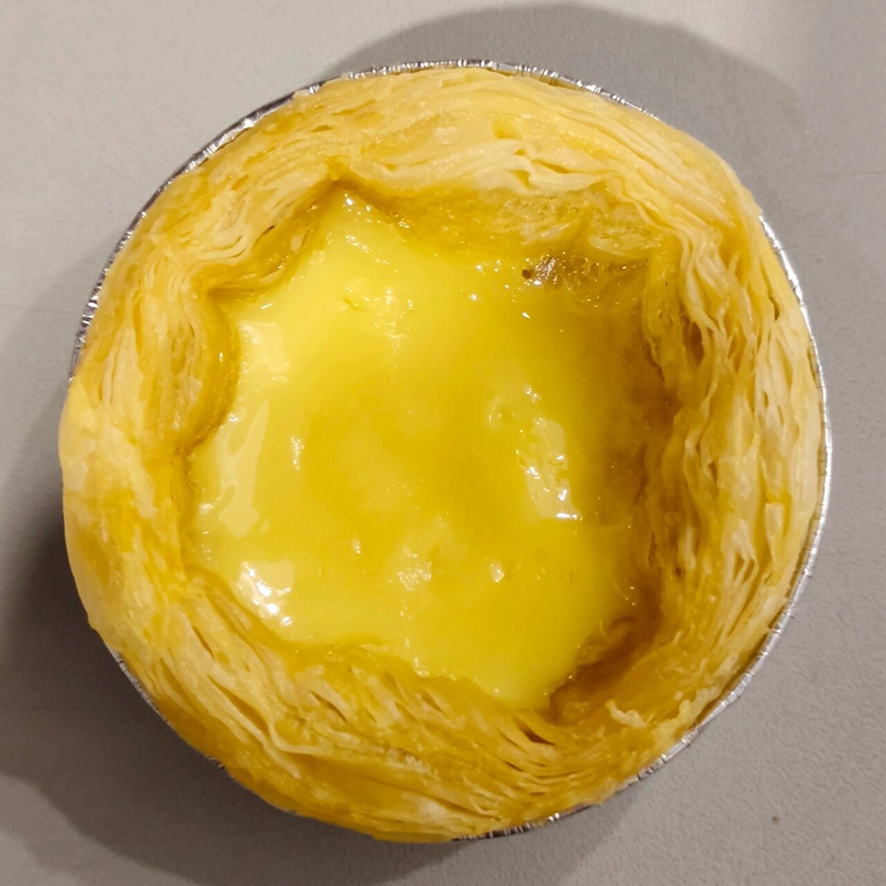 微波炉蛋挞一次成功 第一次用微波炉做蛋挞,效果很成功,塔皮酥酥脆脆