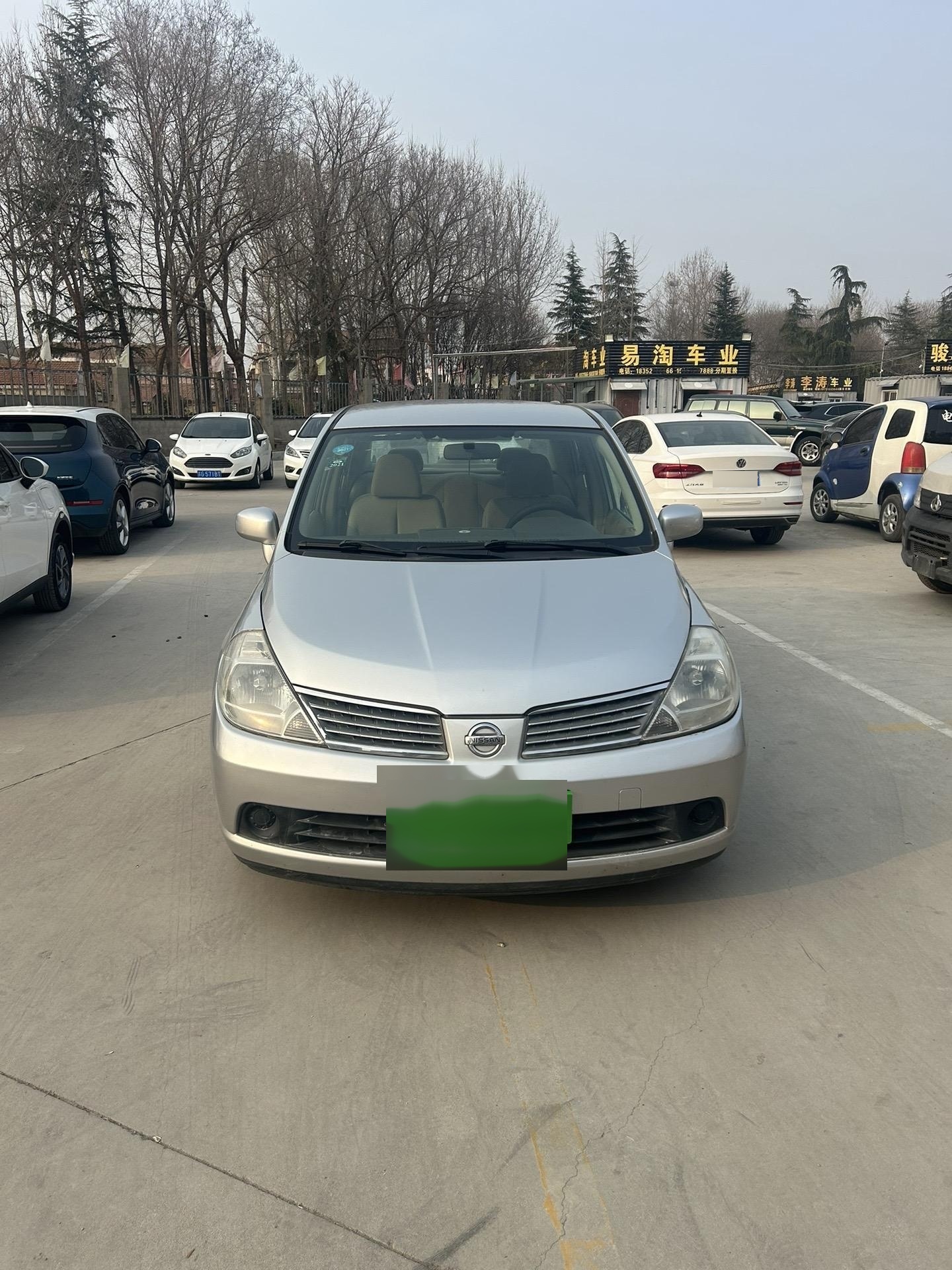 06款尼桑颐达,原版车况,内室干净,1.6手动挡,非常省油.实表14万公里.