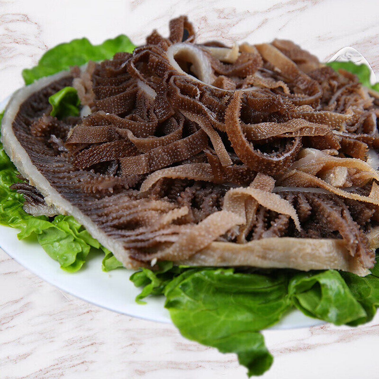 千层肚属于牛的,也叫牛百叶,吃饲料的牛百叶偏黄,吃庄稼的牛百叶发黑