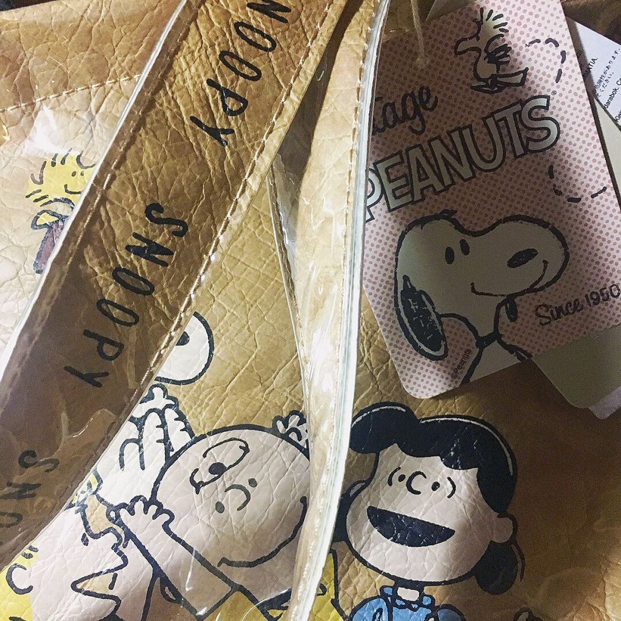 这是一款来自zara童装 可爱史努比牛皮纸单肩包 9015 9515