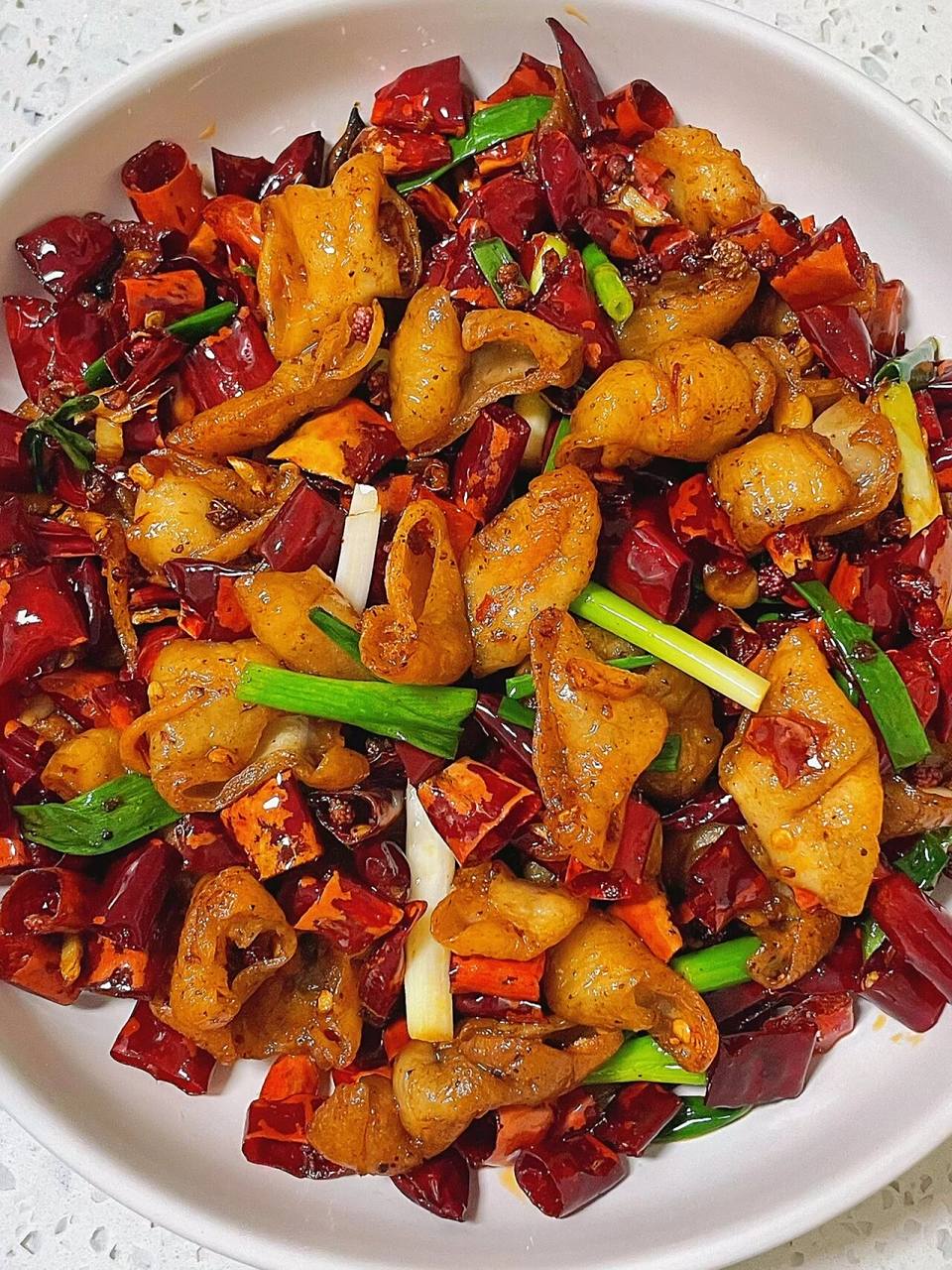 麻辣香脆入味的干煸肥肠～ 91做法: 16615肥肠凉水下锅加姜片