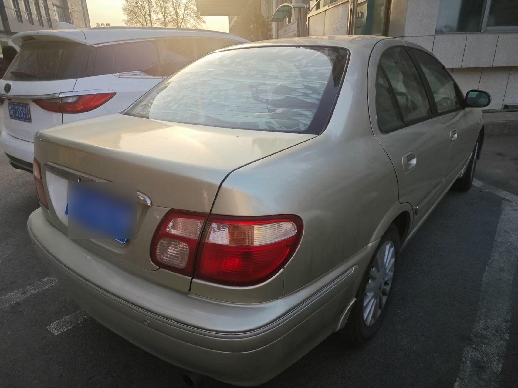 2003年的尼桑阳光自动挡顶配,1万多点