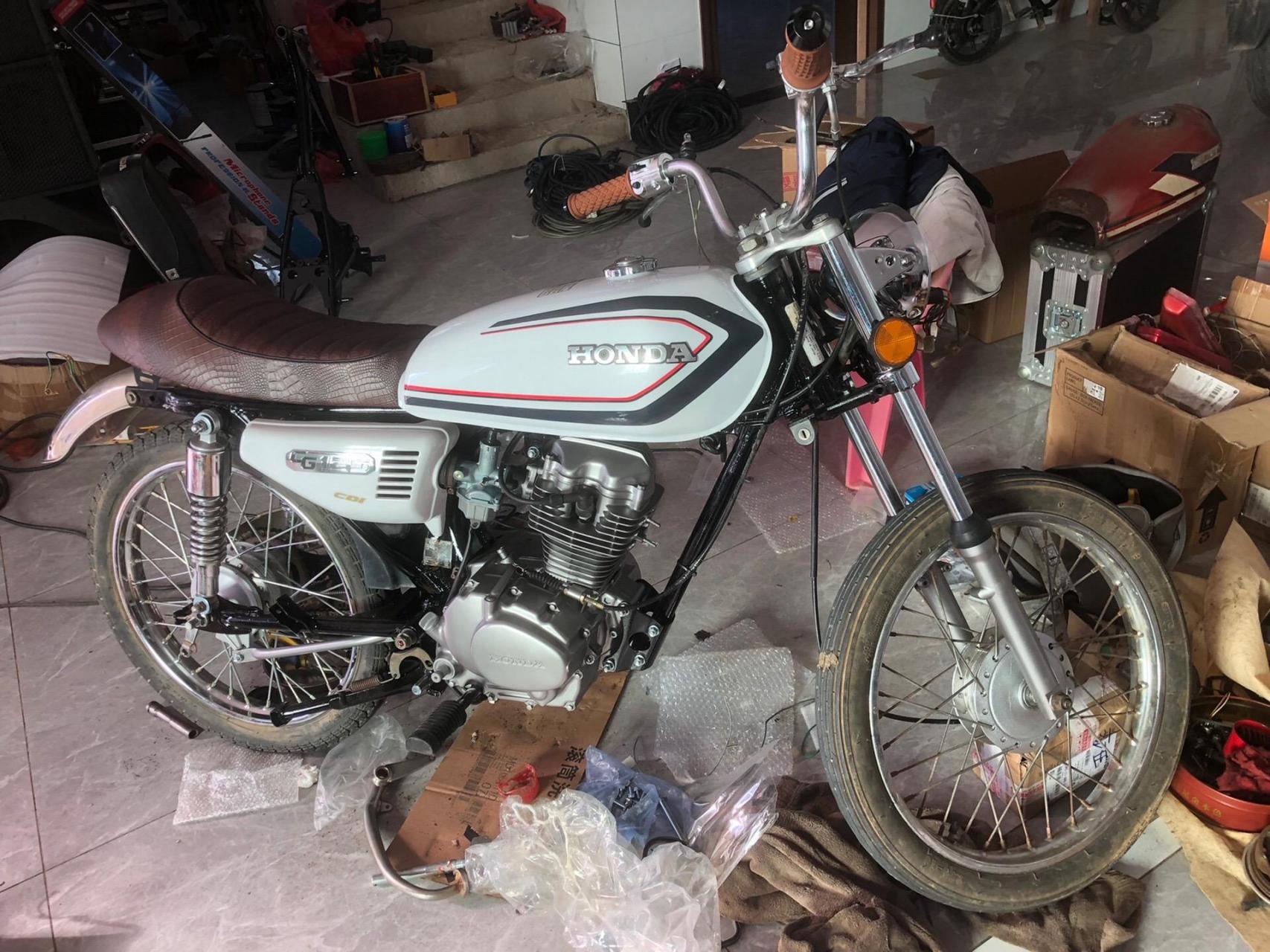 原装日本进口本田cg125c摩托车,二代,白金,方灯,整车原装度很高,非常