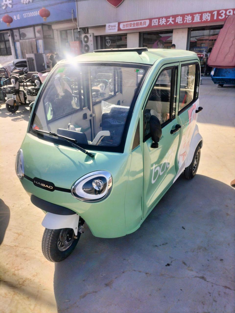 接送孩子上下学代步车 海宝凤凰pro高端三轮电轿?