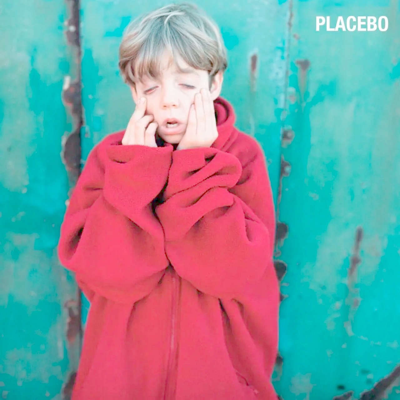 最喜欢的一张专辑封面#  那还得是placebo首专这张,背后是个悲伤的