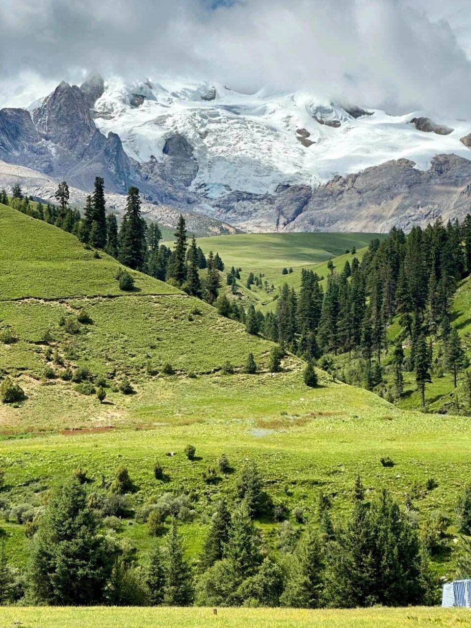 格聂神山|"横断之心" 格聂神山|"横断之心" 格聂山又名格聂神山,雄踞