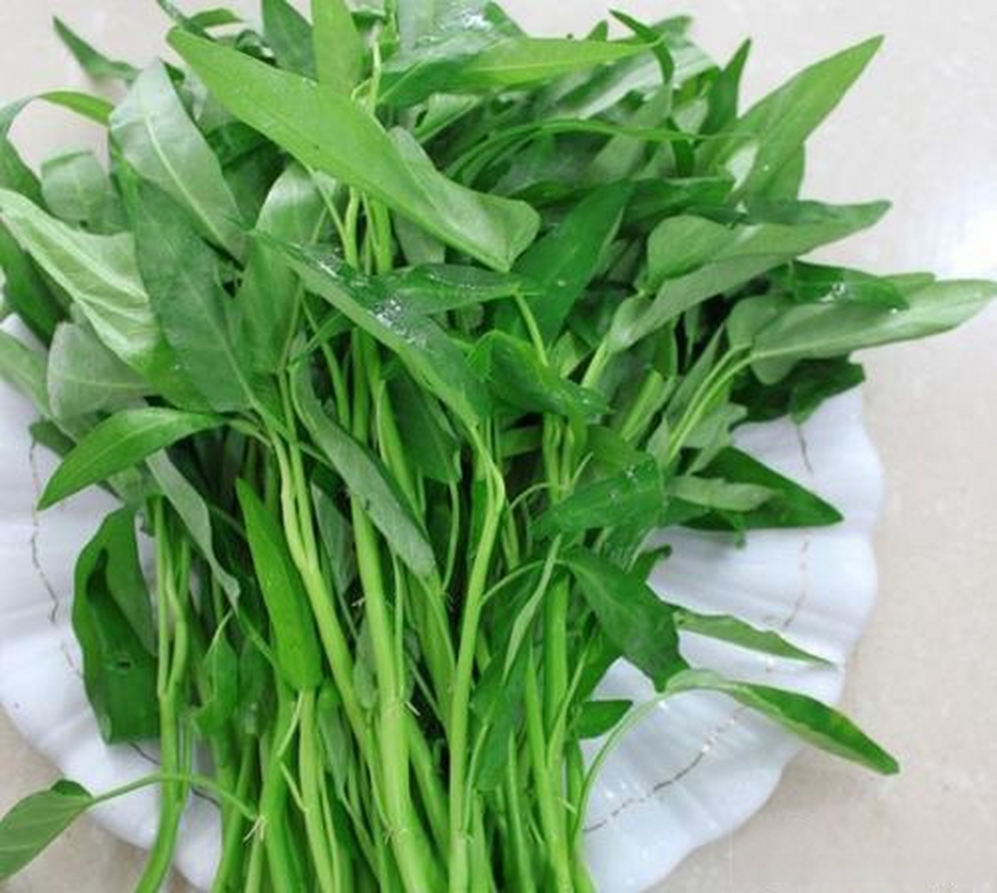 "空心菜"的学名叫蕹菜.老南京人去菜市场买菜都是说"来一把"蕹菜".