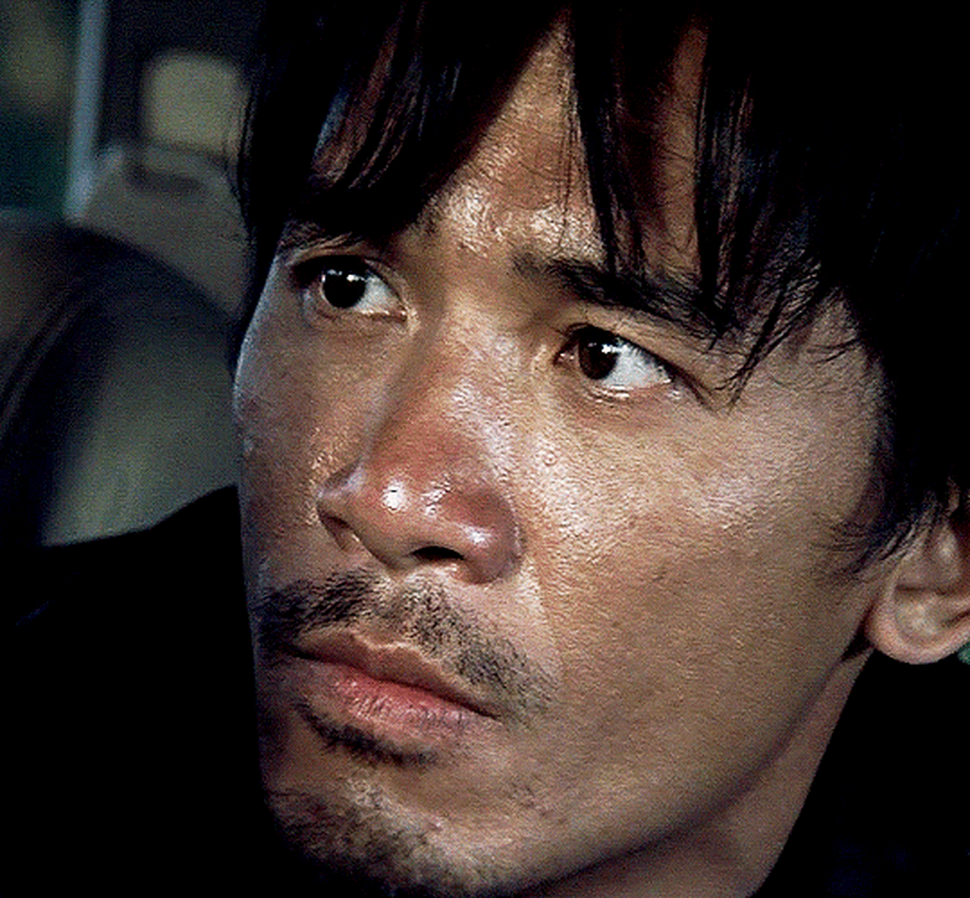 2002年电影《无间道》里的梁朝伟