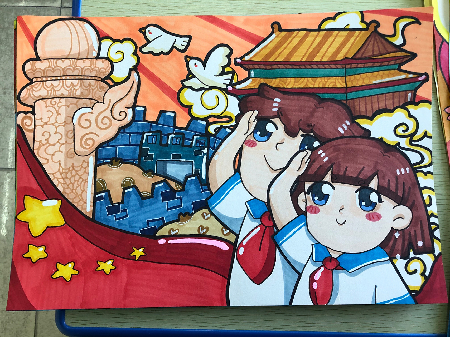 通过画红领巾,天安门,万里长城等,表达对祖国的爱与尊敬!