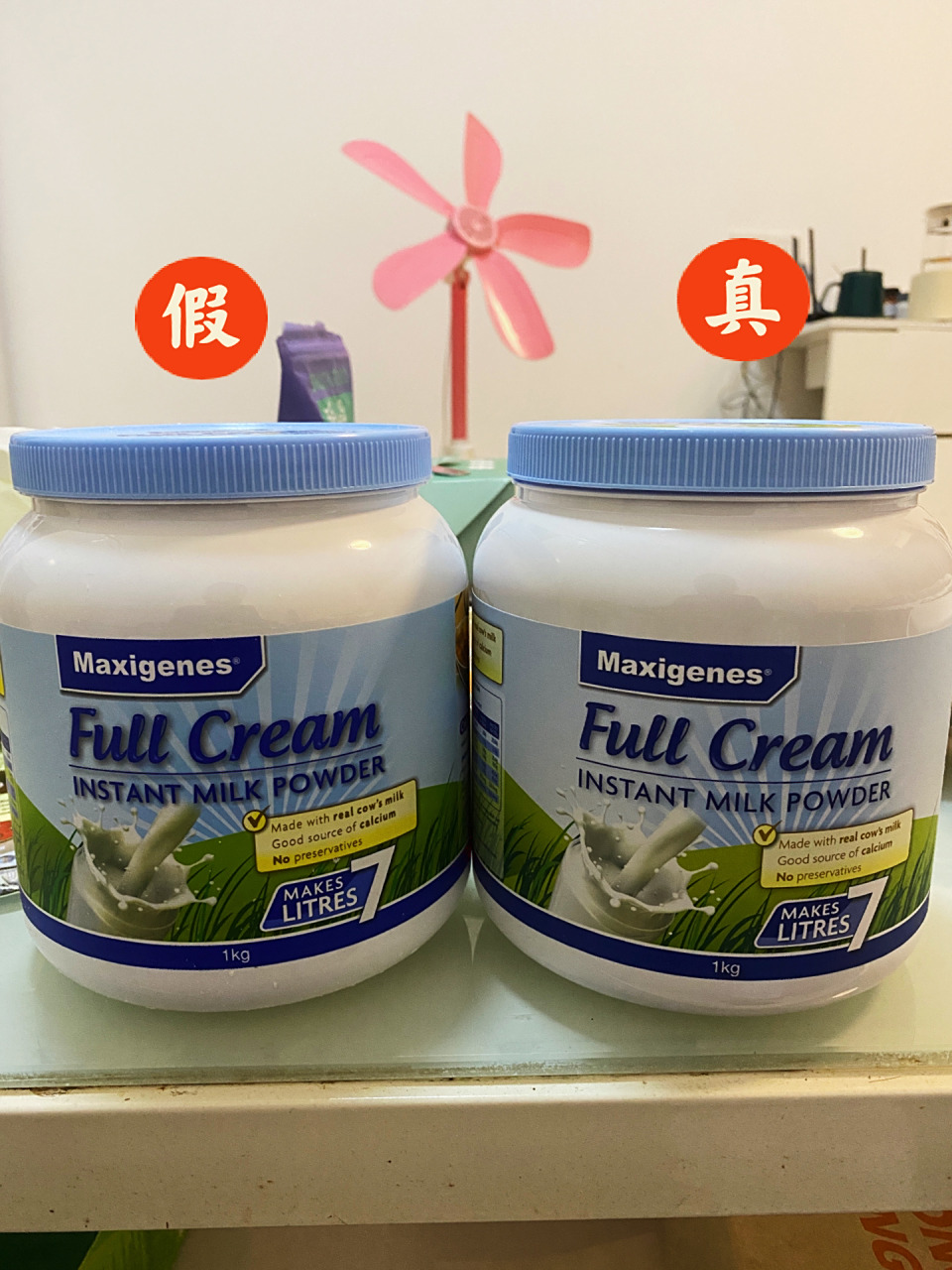 澳洲进口蓝胖子奶粉真假辦别 最明显的外观区别真货淡蓝色,假货深蓝色