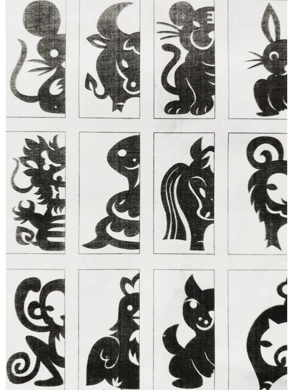 12生肖剪纸模板 大家剪完的对称图,记得剪掉一只小尾巴呦