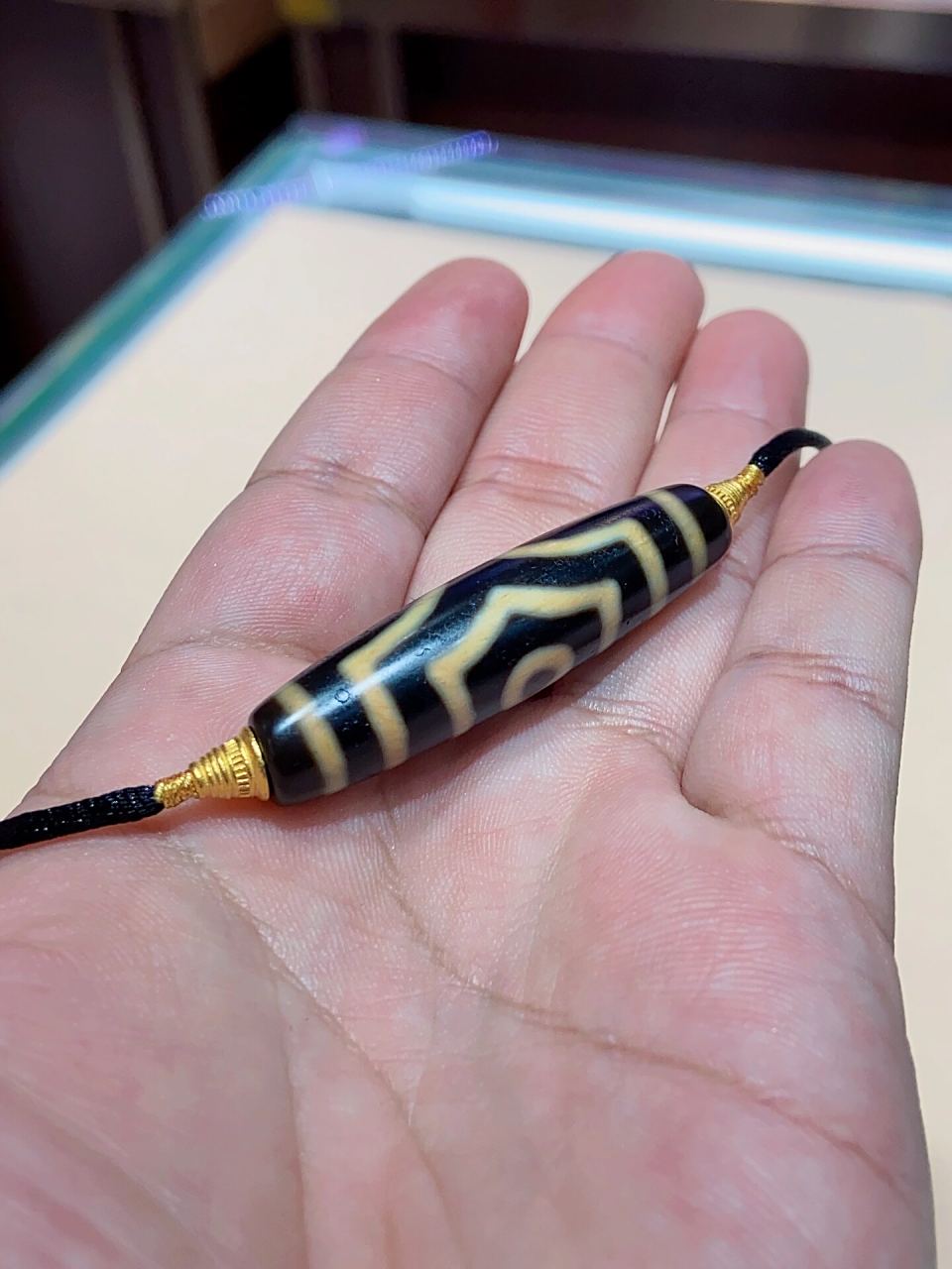 张奎天珠,台湾天珠3a品质 张奎三眼天珠,3a品质,2侧配18k金隔珠(0.