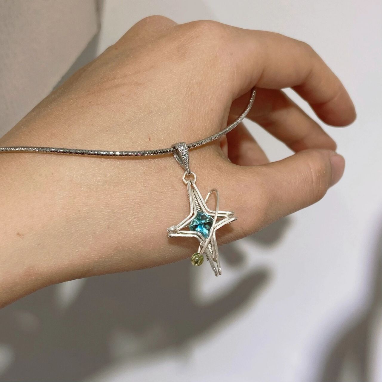 99星芒|托帕石小糖塔绕线吊坠 s999纯银线绕制