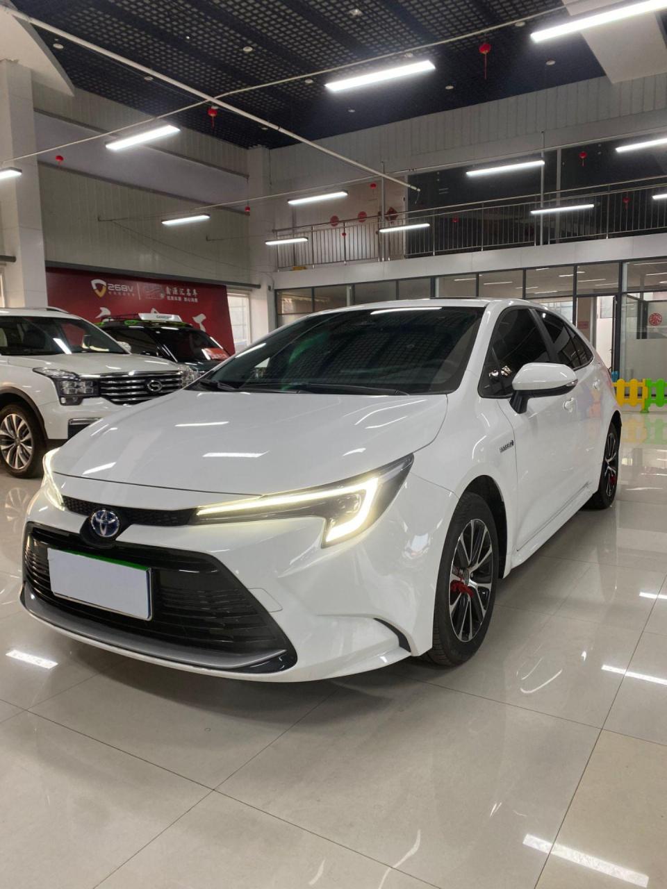 2024年3月19号上牌的丰田雷凌双擎,自动1.8指导价13.