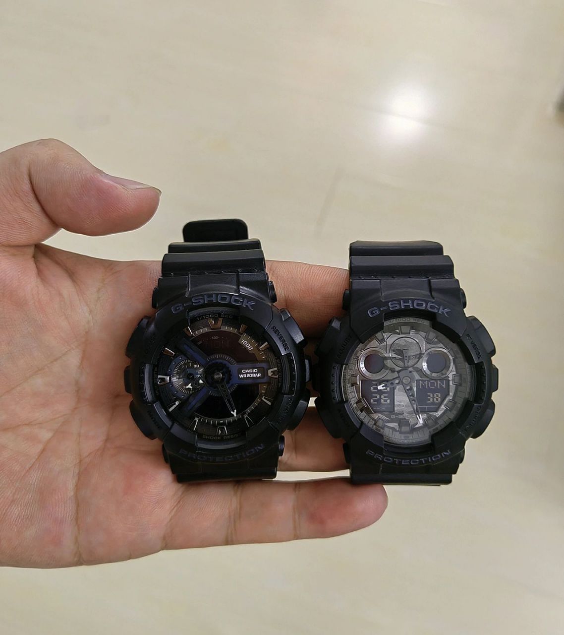 卡西欧g-shock ga100cf拆弹专家 图1:ga 100cf 1a 图2:ga100 1a1