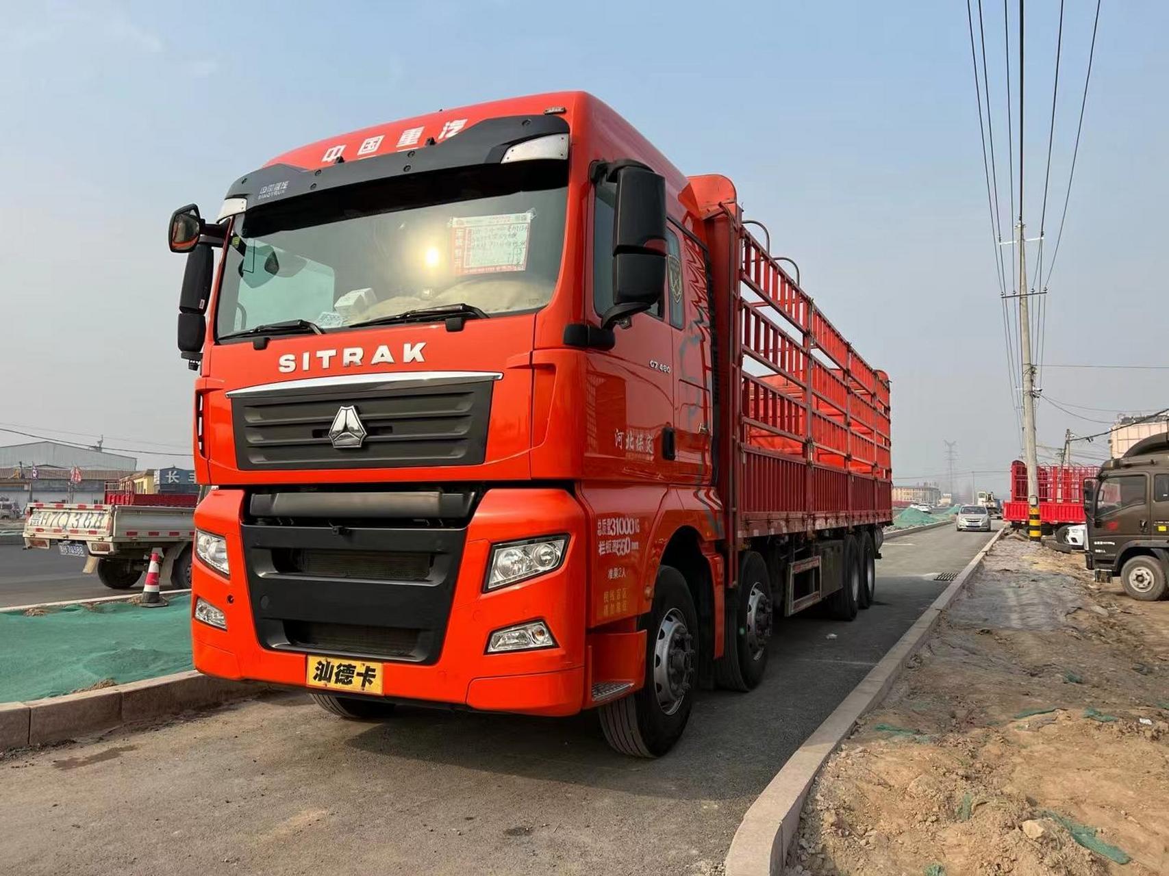 最新到家一台21年汕德卡前四后八高栏载货车,国五排放,480马力德国曼