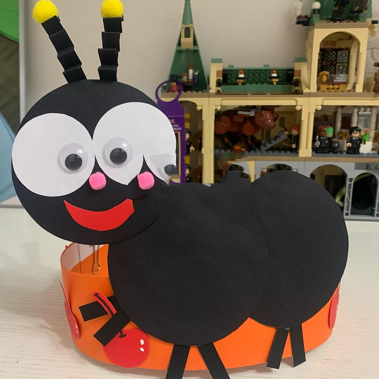 分享手工61小蚂蚁头饰        	 分享一个在学到的蚂蚁头饰,在油菜