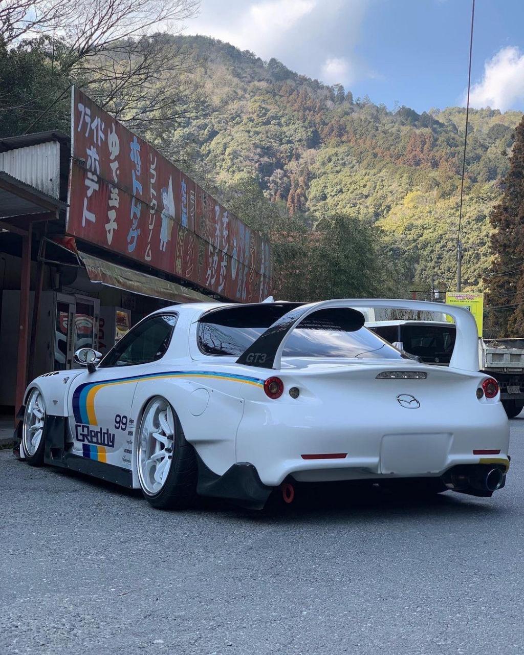 mazda rx7."开它塞车吗?