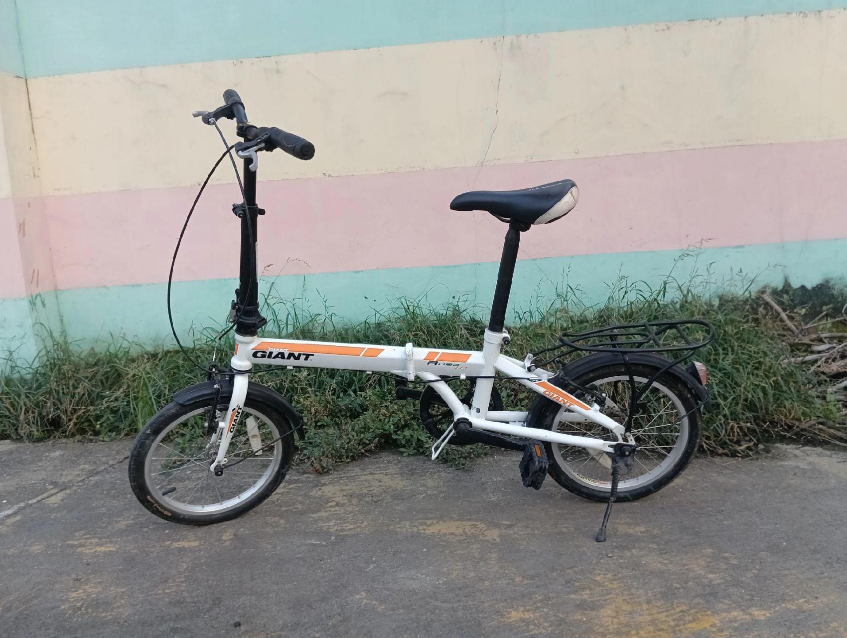 16寸捷安特折叠自行车,原装正品,车子很轻,很好骑,可以折叠放后备箱