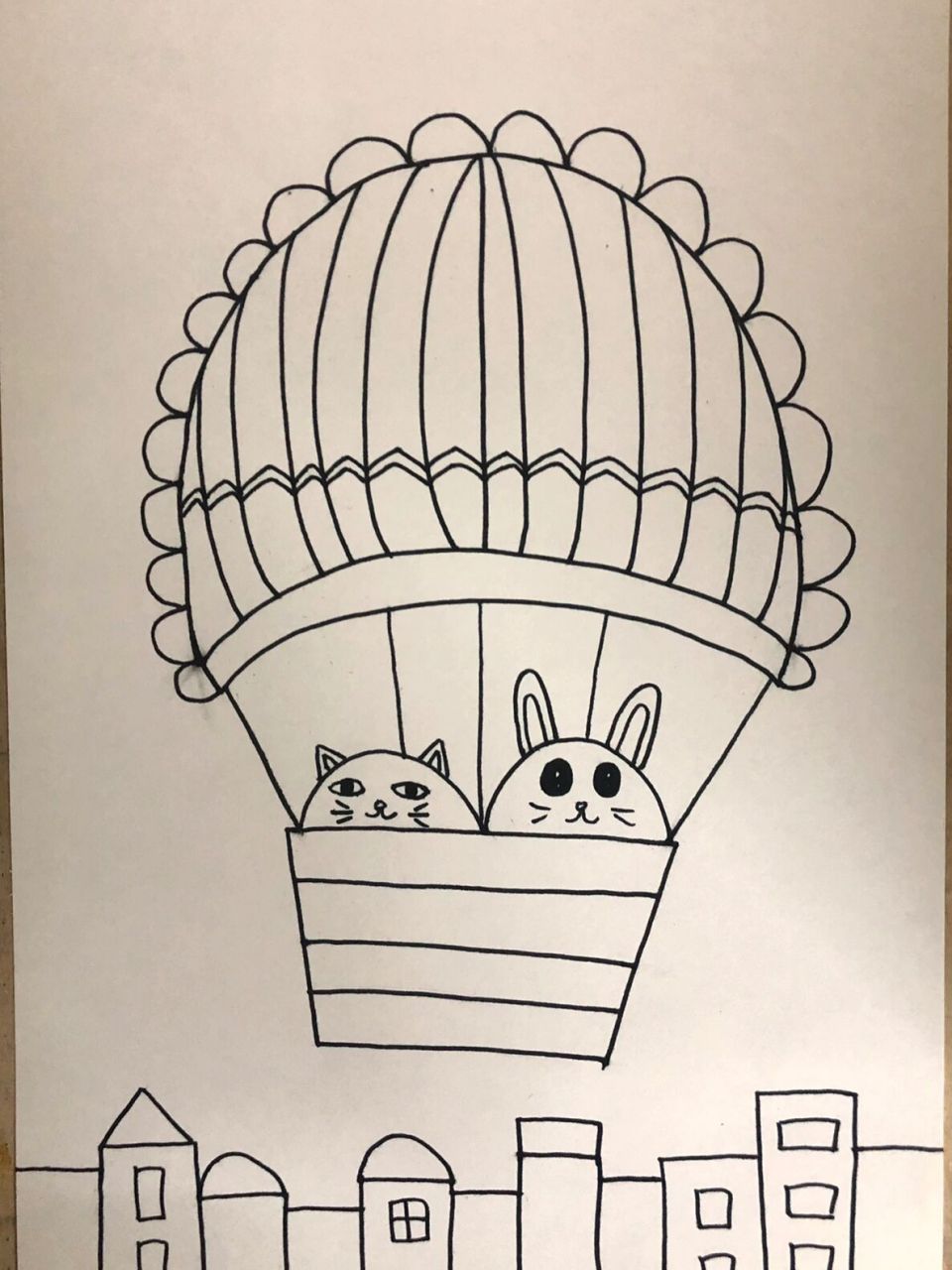 热气球 热气球是一个比空气轻,上半部是一个大气球状,下半部是吊篮的