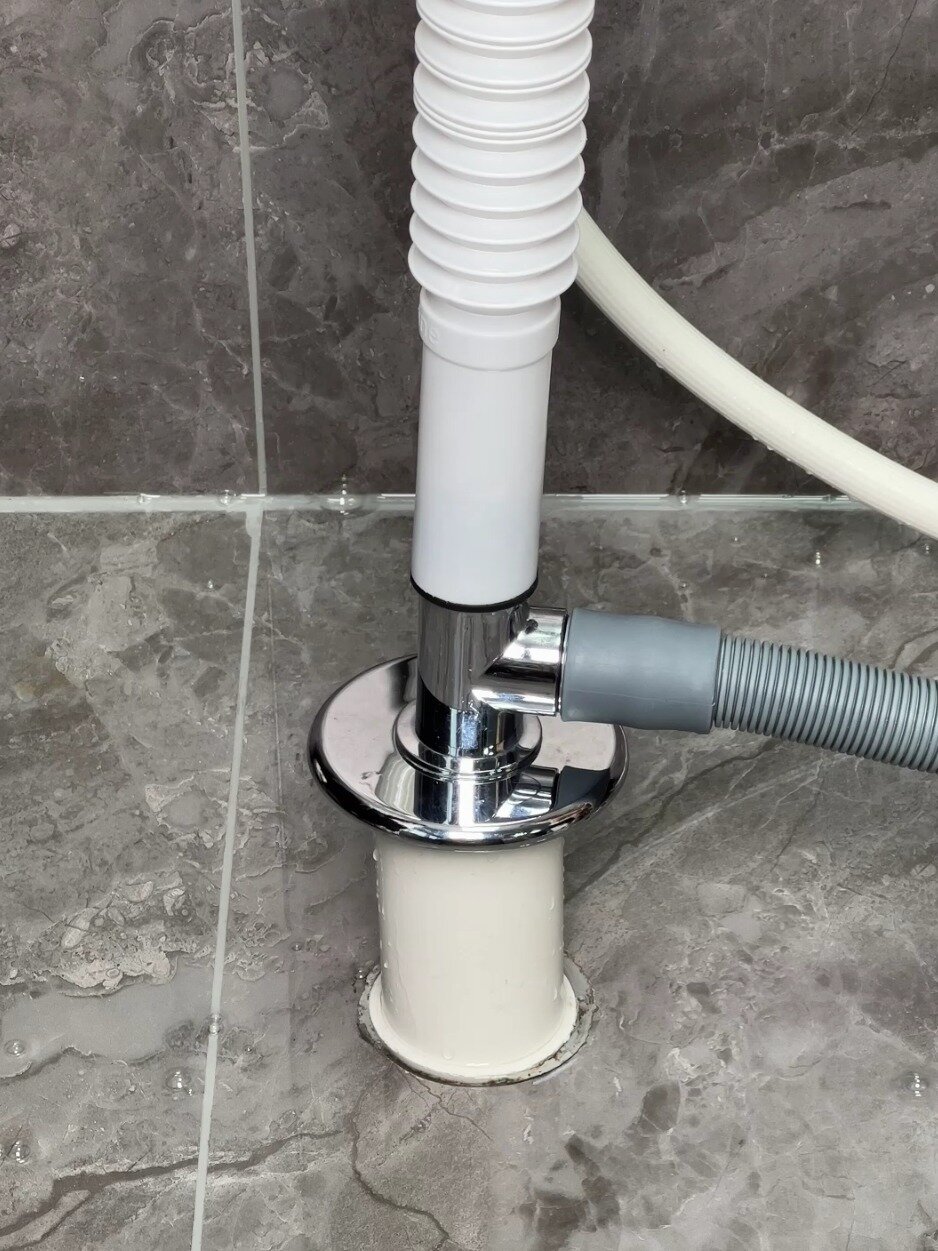 洗衣机的排水管要接三通接头哦