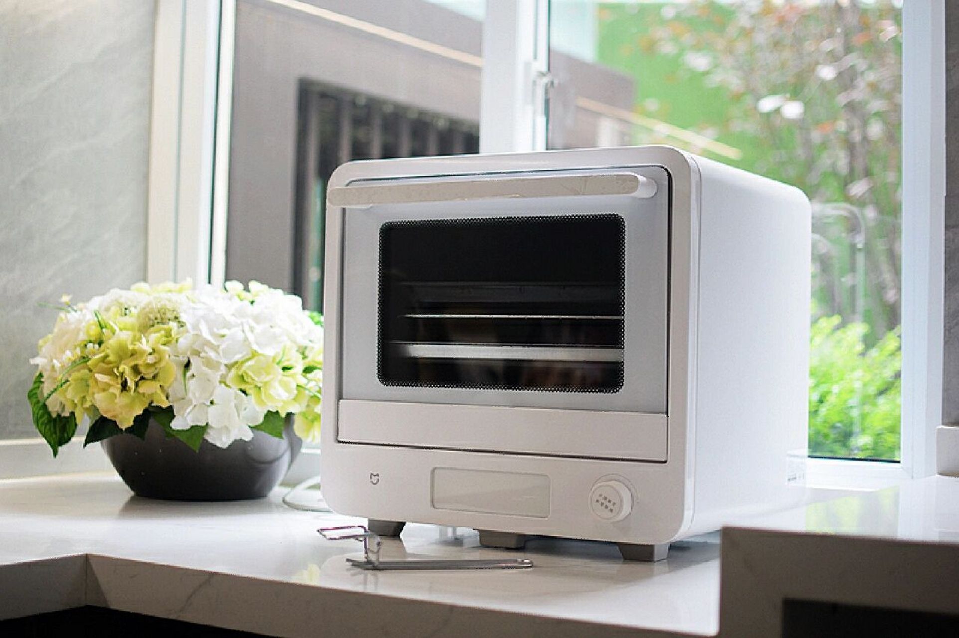 米家智能电烤箱40l,采用立式结构设计,40l大容量支持一层到多层烘烤